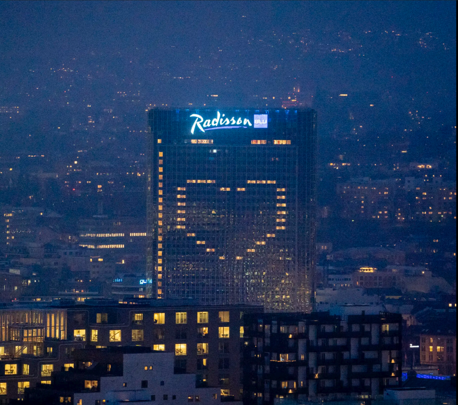 Oslo Plaza with a heart of lit windows.